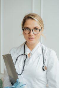 a doctor holding a clipboard