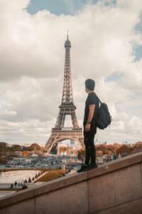 photo of man wearing backpack