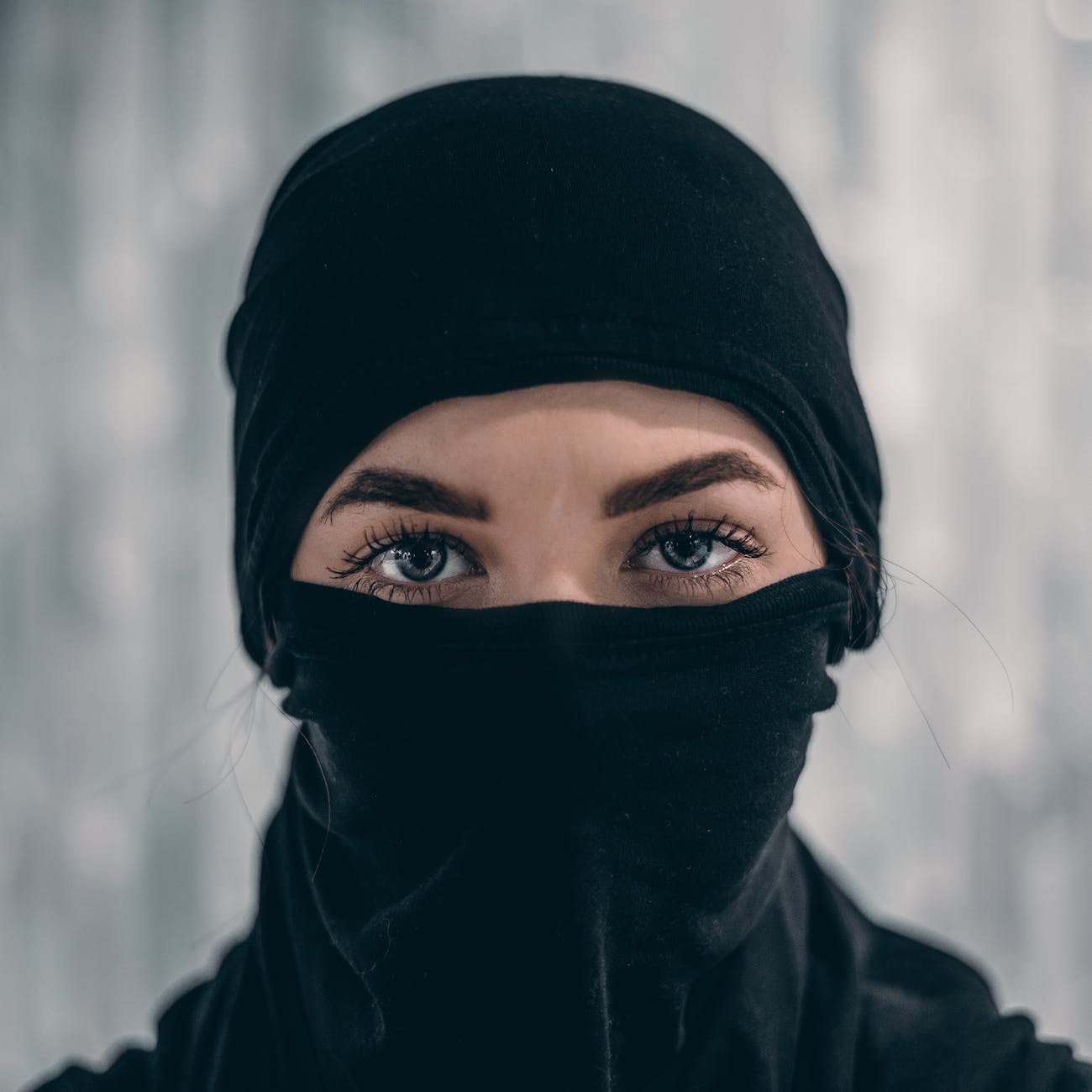 person wearing black mask