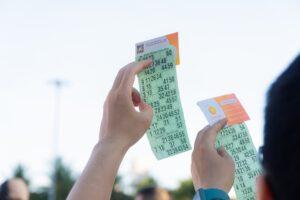 people holding tickets