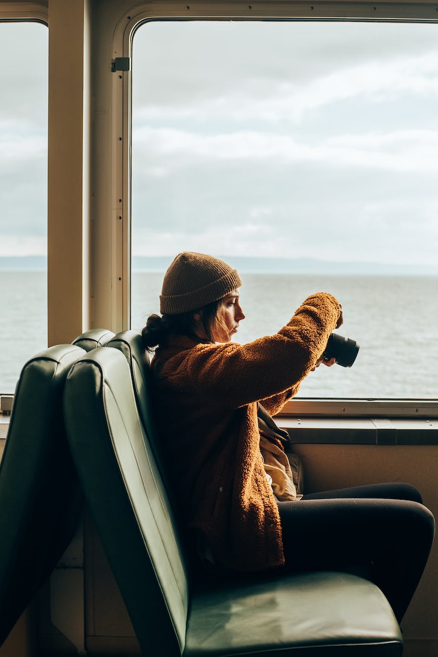 a woman using a camera