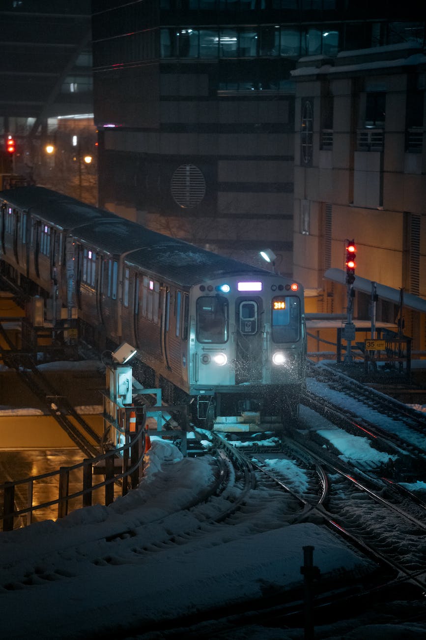 night photography of a train in chicago