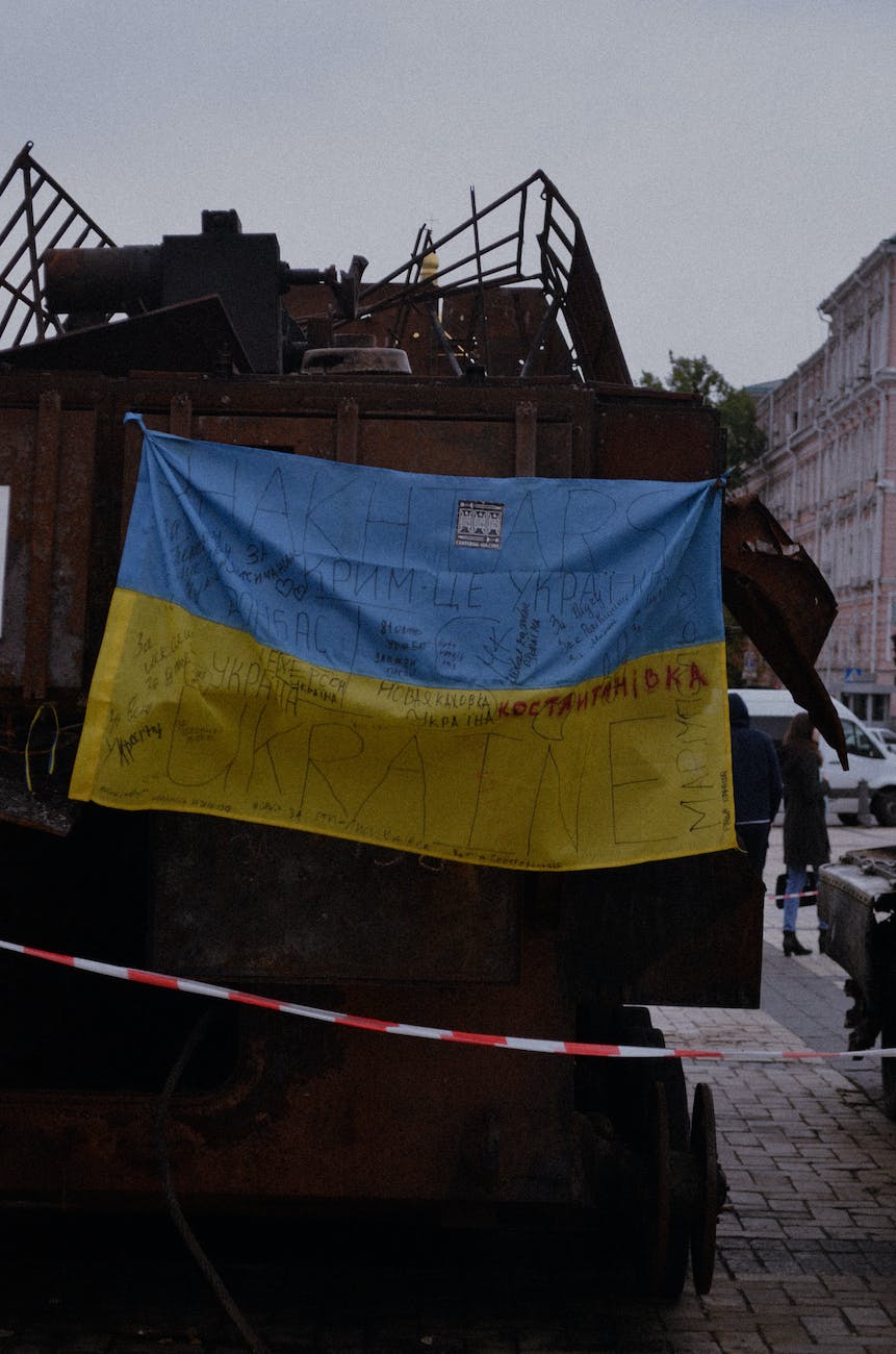 ukrainian flag on a rusty machine