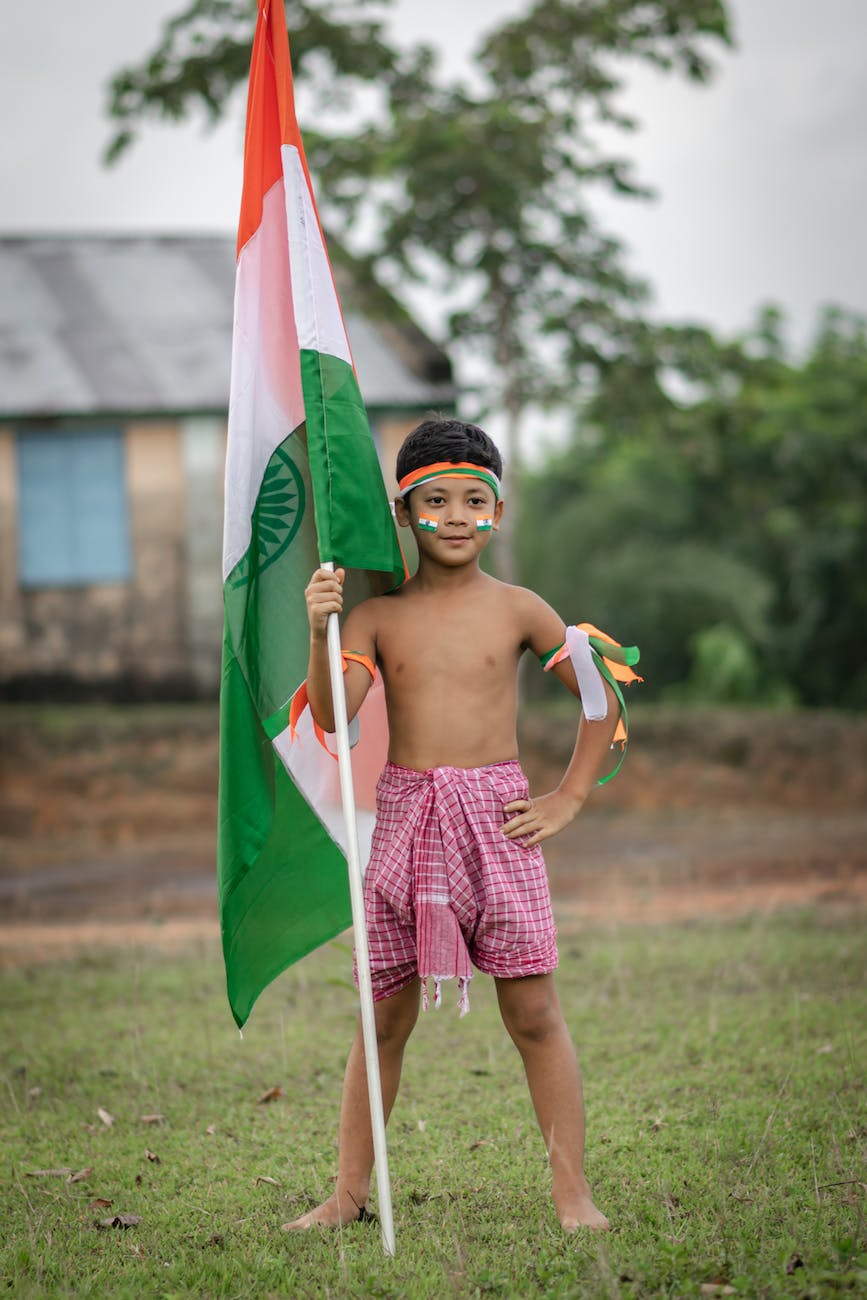 boy holding a flag of india