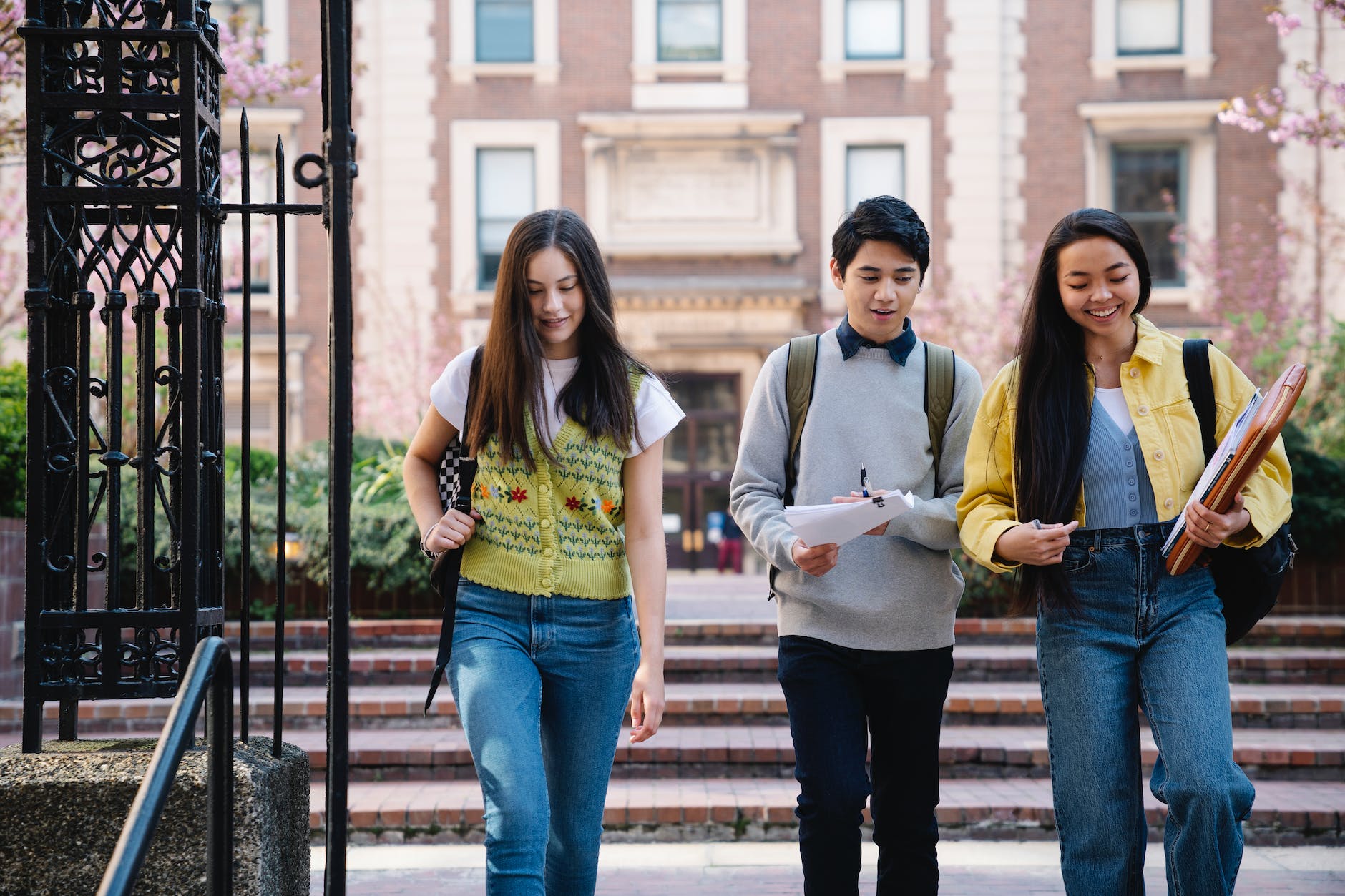 university students walking together