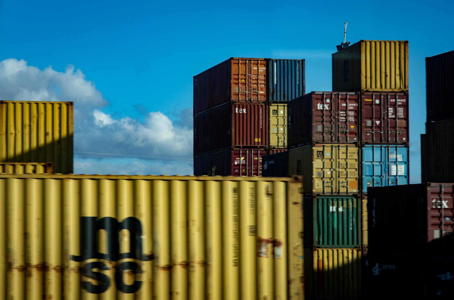 assorted color intermodal containers